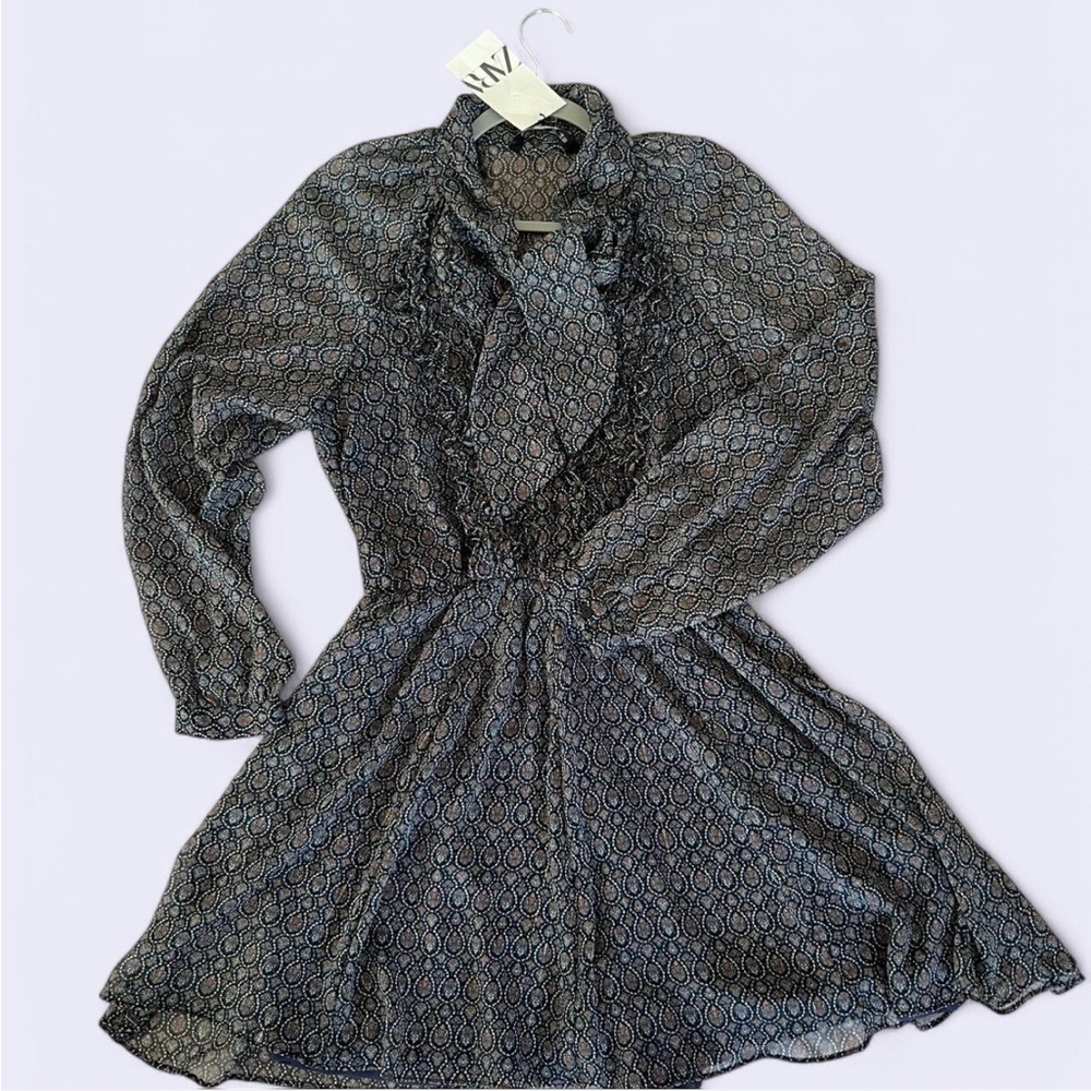 Blue boho Zara Romper with ruffles , size M, button up with neck tie.